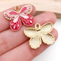 Detail of colorful enamel butterfly charm showing front and textured gold-plated back side - Enamel Rose Red Flower Butterfly (19022)