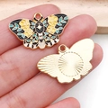 Detail of colorful enamel butterfly charms with floral patterns and golden metal back - Black Yellow Flower Green Leaf Butterfly (18779)