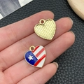 Macro view of heart-shaped USA flag enamel charms showing detail and gold texture - KC Gold Blue White Red Enamel Alloy Heart Shaped Pentagram