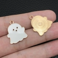 Detailed macro view of double-sided ghost charm with white enamel and golden metal back - White Cute Devil Ghost (15128)