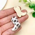 Detail of cowboy boot pendants with gold texture and cow print enamel for DIY jewelry - Gold White Print Cowboy Boot (23777)