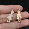 Golden skull skeleton charm with white enamel for DIY jewelry making, front and back view - White Skull (15135)