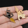 Halloween black cat on broomstick enamel charm with golden alloy finish for DIY jewelry - Flying Broom Red Eye Cat (15137)