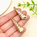 Spiral shell pendants in cream and brown marble textures with golden metal plating - Laser Plated Gold Beige Ocean Conch (23610)