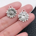 Colgantes de girasol de aleación de plata vintage para joyería DIY con relieve retro - Girasol Redondo de Plata Antigua (10402)