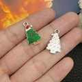 Detailed close-up of a DIY Christmas tree charm with green enamel and a red Santa hat - Green Christmas Tree (19675) 22x13mm