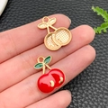 Macro view of cherry-shaped enamel pendants with gold finish for DIY jewelry making - KC Gold Red Enamel Fruit Single Cherry (23446) / 20x16x3mm