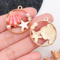 Détails de pendentifs océan en émail rose avec étoile de mer et perle sur alliage doré - Coquillage Étoile de Mer Rond Émaillé Rose (12040)