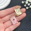 Gold sun rays journal and pink medical cross notebook enamel charms for DIY keychains - Pink Casebook (23061)