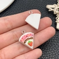 Macro detail of DIY resin strawberry cake slice pendant with cream and silver metal loop - White Miniature Triangular Strawberry Cake (24588)