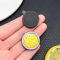 Macro detail of passion fruit resin pendant with purple shell and silver hook for DIY - Passion Fruit