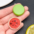 Detail of realistic resin watermelon pendants with silver loops for DIY jewelry making - Watermelon (Green Bottom)