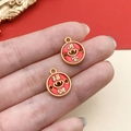 Red enamel and gold-plated charms with Chinese characters for luck and wealth - Double Sided Round Wealth Charm (22538)