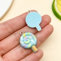 Macro detail of 3D resin lollipop charms with spiral patterns for DIY jewelry making - Lake Blue Resin Lollipop (24572) / 26x17x5mm