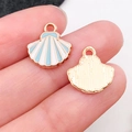 Pendentif coquillage émaillé bleu et blanc avec dos doré pour création de bijoux DIY - Coquillage Émail Bleu Lac (10992)