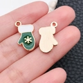 Detail of Christmas glove charms with enamel oil finish and gold snowflake pattern - Drip Oil Green Snowflake Christmas Glove (9900)