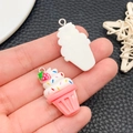 Pink cupcake resin charm with white cream and strawberry detail on silver hook - Resin White Pink Strawberry Ice Cream (19712)