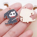 Detail of Halloween cat grim reaper enamel charms with scythe and golden metal plating - 1 Piece (25x20.5mm)