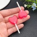 Dettaglio di ciondoli a lecca-lecca a cuore rosa con glitter per la creazione di gioielli - Rosa Rosso Trasparente (24557)