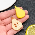 Realistic resin pear charms with full fruit and sliced half designs and metal rings - Pear
