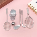Silver sports-themed charms including tennis rackets and golf clubs for DIY accessories - Assorted Sports Equipment Charms Set