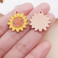 Detailed view of sunflower enamel charms with smiling faces and metal dotted back - Yellow Drip Oil Thanksgiving Sun Charm (25072) / 22x20x1mm