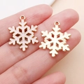 Pink enamel and gold snowflake charms for DIY Christmas bracelets and jewelry crafts - Pink Christmas Snowflake Slice Style (24974)