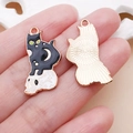 Enamel black cat on skull charm pendant with green eyes and golden moon detail - 1 Piece (14x28mm)