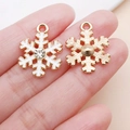 Christmas snowflake pendants in gold and white enamel with sparkling center rhinestones - White Christmas Snowflake Style (24968)