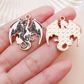 Detail of dragon pendant with black and white enamel finish and gold plated back texture - Double Winged Flying Dragon Style (19350)