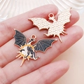 Detailed view of dragon charms showing colorful enamel front and textured gold metal back - Yellow Sun Western Flying Dragon Style (25228)