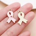 Ciondolo a fiocco rosa con scritta LOVE per creazione gioielli fai da te dorato - Ciondolo Nastro con Fiocco Love Rosa (24858)