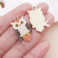 Macro shot of colorful owl enamel alloy pendants for DIY jewelry making - Black-Yellow Flesh Drip Oil Owl Charm (25069) / 28x16x1mm