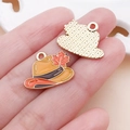 Detail showing colorful enamel maple leaf hat pendant and textured golden metal back - Yellow Drip Oil Maple Leaf Hat Charm (25062) / 15x19x1mm