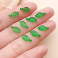 Macro view of transparent green acrylic leaf pendant for DIY jewelry and phone charms - Mini Leaf (21950) / 1 Piece (10x5mm) / Dark Green