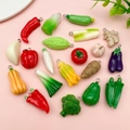 Flat lay of colorful resin vegetable charms including chili and broccoli for DIY crafts - 20 Resin Vegetable Styles (SN1497) / 20 Pieces Set