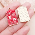 Gros plan d'un pendentif DIY rouge et or avec des vœux de bonheur calligraphiés chinois - Que Tous Vos Souhaits Se Réalisent - Rouge (21496)