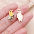 Macro detail of alloy bee charms showing yellow enamel coating and metallic textured back - Yellow Enamel Bee (25159)