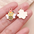 Close-up of cute honey bee enamel charms with golden crowns for DIY jewelry making - Yellow Enamel Insect Crown Bee (25149)