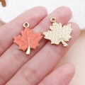 Orange enamel maple leaf charm with gold veins and textured metal back for DIY crafts - Orange Drip Oil Maple Leaf Charm (25056) / 23x19x2mm