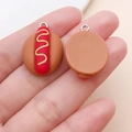 Miniature hot dog resin charm for DIY jewelry with silver metal loop and realistic details - Hot Dog Bread (17082)