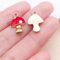 Red enamel mushroom charm with gold-toned alloy base for DIY jewelry making - 11x17mm Red Enamel Plated Zinc Alloy Mushroom (16997)