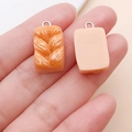 Miniature resin bread and toast charms with metal rings for DIY jewelry and keychain crafts - Toast Shredded Bread (24639)