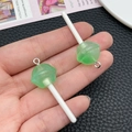 Translucent green glitter resin lollipop pendant charm with a silver metal loop for DIY crafts - Transparent Green