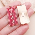 Pendentif émail rouge avec texte de vœux et breloque dorée avec motif de soleil - Chance Continue - Rouge (16588)