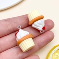 Resin cream cupcake charms in white and orange with silver rings for DIY crafts - Heart Cream Cupcake (24085) / 1 Piece (25x17x17mm) / Yellow