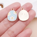 Blue enamel Easter egg charms with white daisy patterns for DIY jewelry making - Lake Blue Easter Flower Egg (25123)