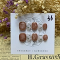 Uñas postizas con textura de mármol ámbar y patrones florales con bordes dorados - XS / Mármol Té con Leche
