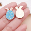 Sky blue Easter egg charm with rabbit ears and colorful dots in golden finish - Lake Blue Easter Spotted Bunny Egg (25135)