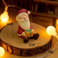 Miniature resin Santa Claus figurine with gift box for Christmas desktop decoration - Santa Claus Holding Gift Box Figure (No. 7)